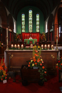 The Church decorated and with candles alight.  