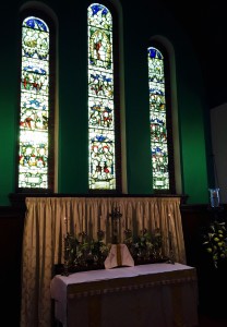 The sun rises and shines through the East Window of Saint Helen's Church, early on Easter Sunday Morning 2016 